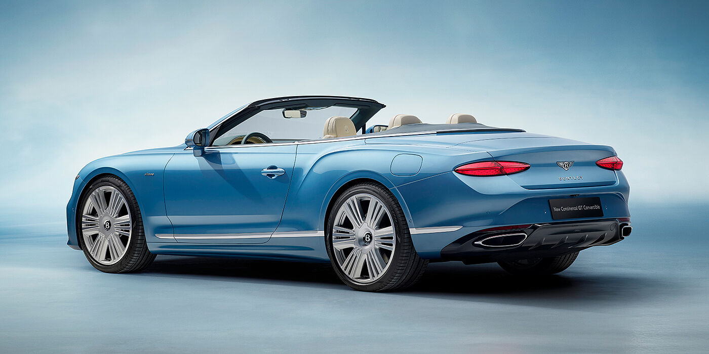 Bentley Abu Dhabi New Bentley Continental GTC Azure convertible rear view in Light Windsor blue paint with 22 inch ten spoke wheels and chrome exterior details