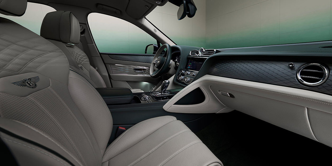 Bentley Abu Dhabi Bentley Bentayga Extended Wheelbase Atelier Edition SUV front interior in Portland and Cumbrian Green hides with Dark Tint Diamond Brushed Aluminium veneer