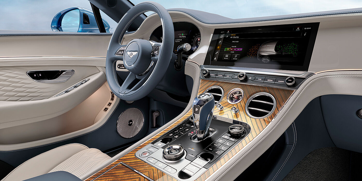 Bentley Abu Dhabi New Bentley Continental GTC Azure convertible interior front cabin view with Linen and Brunel hides and Piano Linen by Mulliner veneer featuring centre console and centre MMI screen